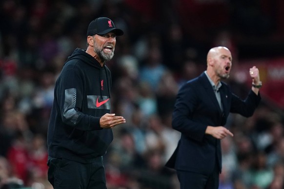 Manchester United, ManU v Liverpool - Premier League - Old Trafford Liverpool manager Jurgen Klopp left and Manchester United manager Erik ten Hag on the touchline during the Premier League match at O ...