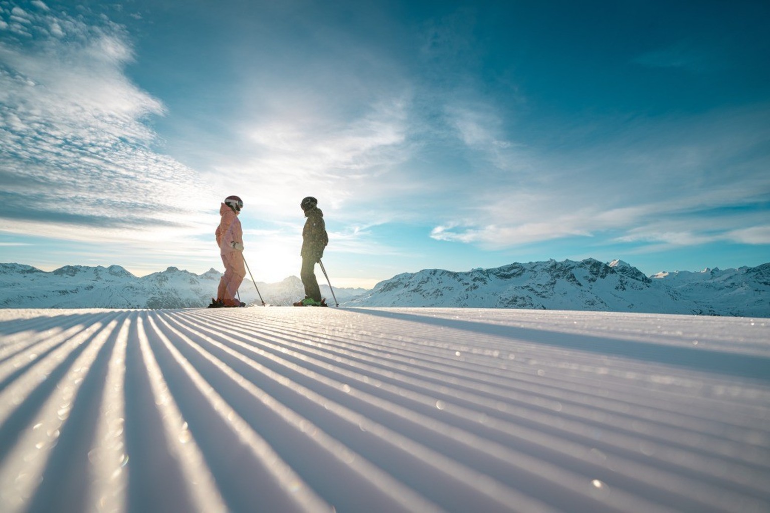 Sonnenaufgang im Skigebiet Corviglia