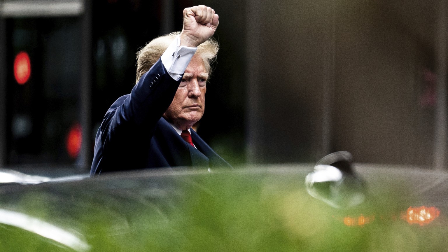 Former President Donald Trump gestures as he departs Trump Tower, Wednesday, Aug. 10, 2022, in New York, on his way to the New York attorney general's office for a deposition in a civil investigation. ...