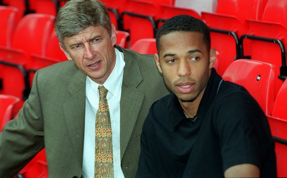 Arsenal&#039;s latest signing, Thierry Henry, right, with Manager Arsene Wenger, pictured at Highbury in north London, Tuesday, August 3, 1999. Henry signed for Arsenal from Juventus for a reported cl ...
