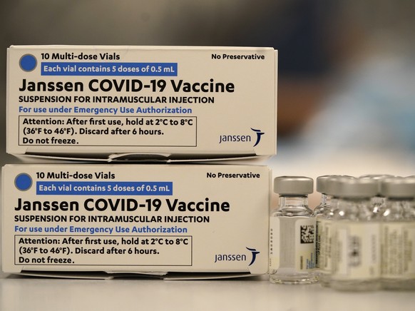 FILE - Boxes containing the Johnson &amp; Johnson COVID-19 vaccine sit next to vials in the pharmacy of National Jewish Hospital for distribution, in east Denver. A judge on Wednesday, Sept. 29, 2021, ...