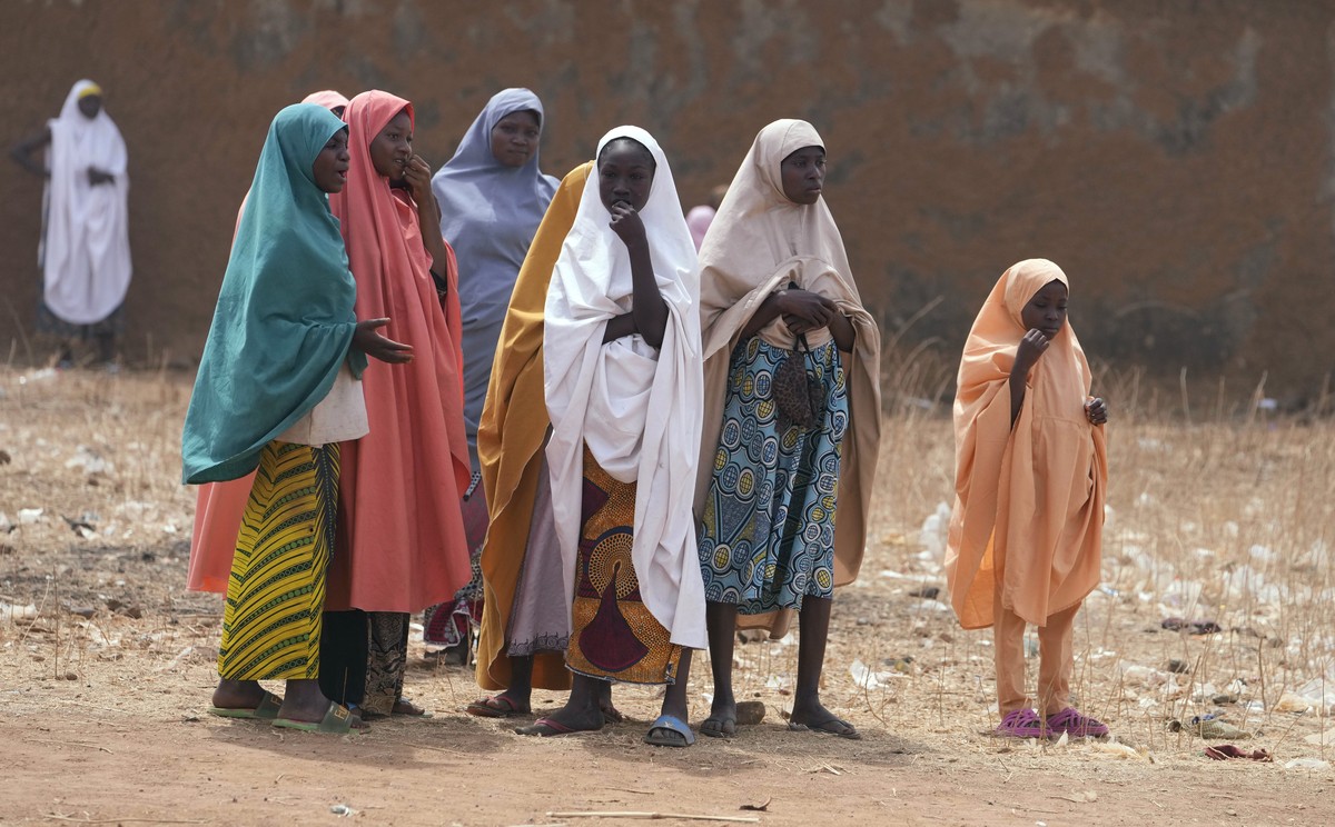 Parents wait for news about the kidnapped LEA Primary and Secondary School Kuriga students in Kuriga, Kaduna state, Nigeria, Saturday, March 9, 2024. Security forces swept through large forests in Nig ...