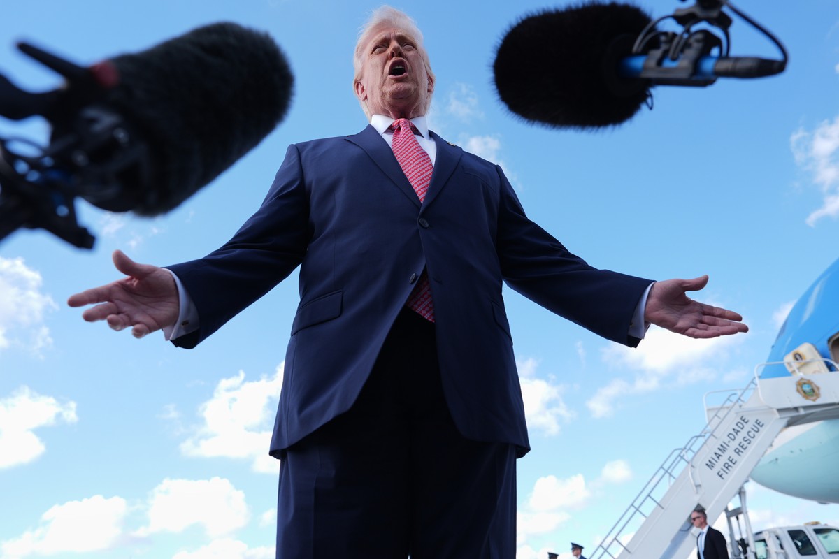 President Donald Trump speaks to reporters after stepping off Air Force One, Friday, March 27, 2026, at Miami International Airport in Miami. (AP Photo/Mark Schiefelbein)
Donald Trump