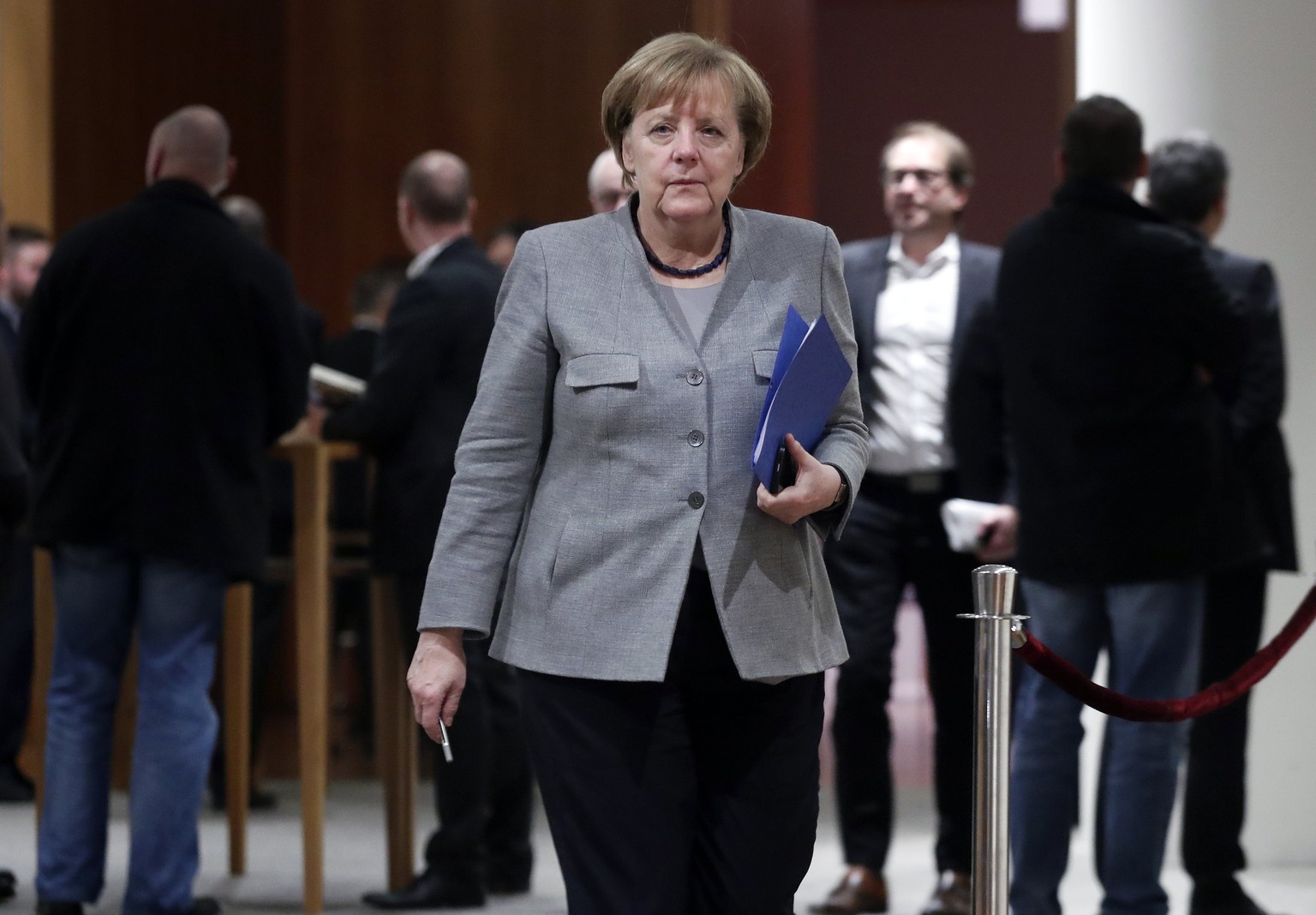 epa06339434 Chancellor Angela Merkel during a break in the exploratory talks of four political parties in the Representative Office of the State Baden-Wuerttemberg in Berlin, Germany, 19 November 2017 ...