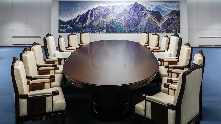 This April 23, 2018, photo provided by South Korea Presidential Blue House on Wednesday, April 25, 2018, shows a meeting room for the April 27 summit between South and North Korea at the Peace House a ...