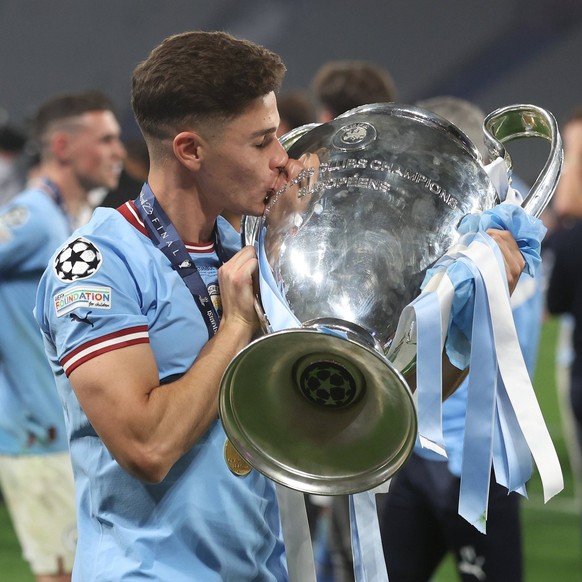 Istanbul, Turkey, 10th June 2023. Julian Alvarez of Manchester City with the trophy after the UEFA Champions League Final match at the Ataturk Olympic Stadium, Istanbul. Picture credit should read: Pa ...