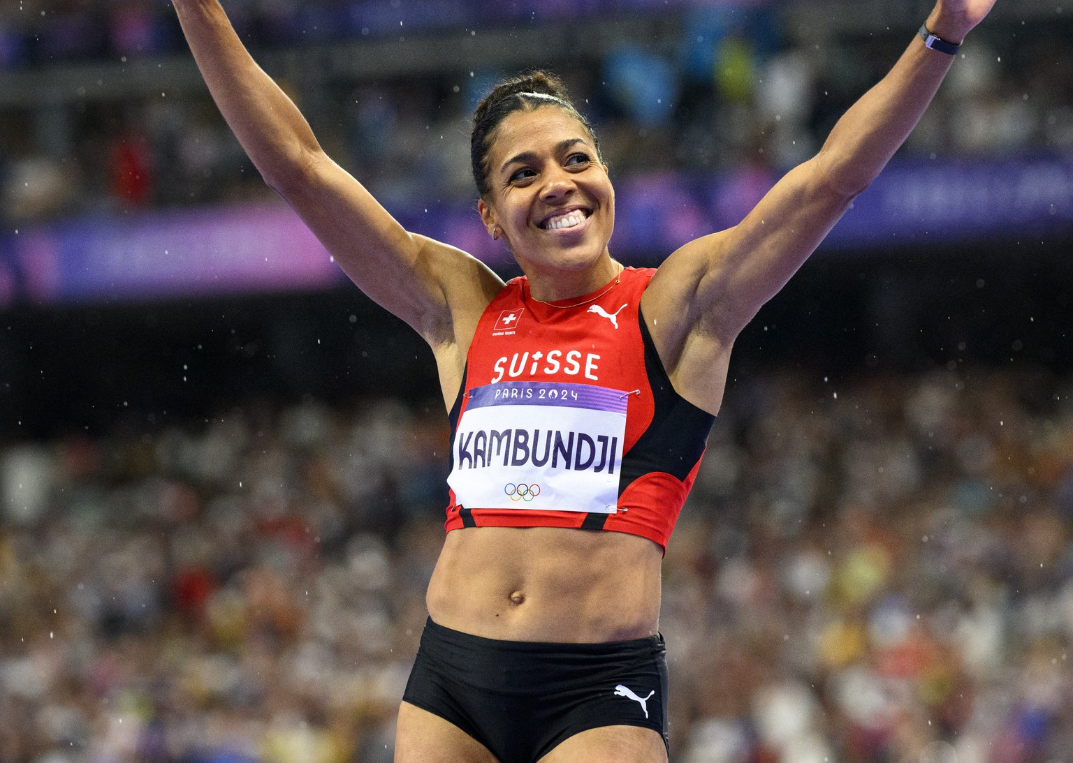 Mujinga Kambundji of Switzerland reacts after the women&#039;s 100m final at the 2024 Paris Summer Olympics in Paris, France, Saturday, August 3, 2024. (KEYSTONE/Laurent Gillieron)