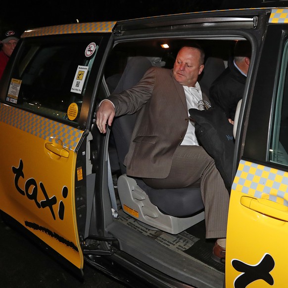 Gerard Gallant, former Florida Panthers head coach, gets into a cab after being relieved of his duties following an NHL hockey game against the Carolina Hurricanes, Sunday, Nov. 27, 2016, in Raleigh,  ...