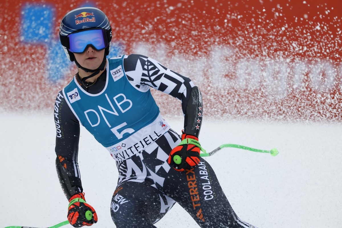 New Zealand's Alice Robinson checks her time at the finish area of an alpine ski, women's World Cup super-G race, in Kvitfjell, Norway, Saturday, March 2, 2024. (AP Photo/Alessandro Trovati)