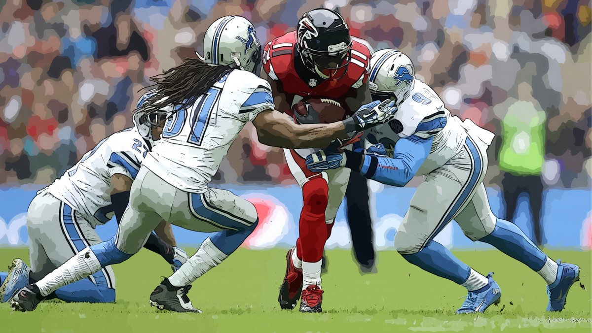 Mit vereinten Kräften versuchen die Detroit Lions, Julio Jones von den Atlanta Falcons zu stoppen.