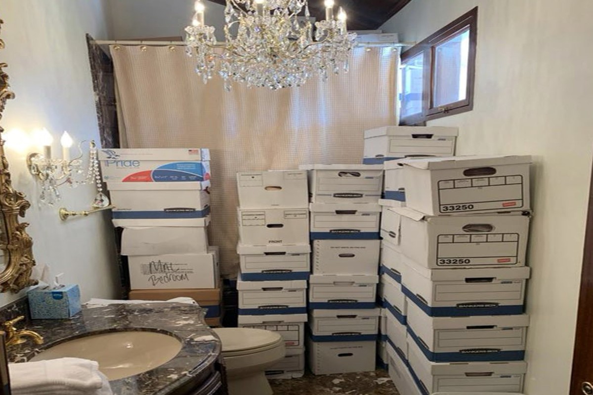 This image, contained in the indictment against former President Donald Trump, shows boxes of records stored in a bathroom and shower in the Lake Room at Trump's Mar-a-Lago estate in Palm Beach,  ...