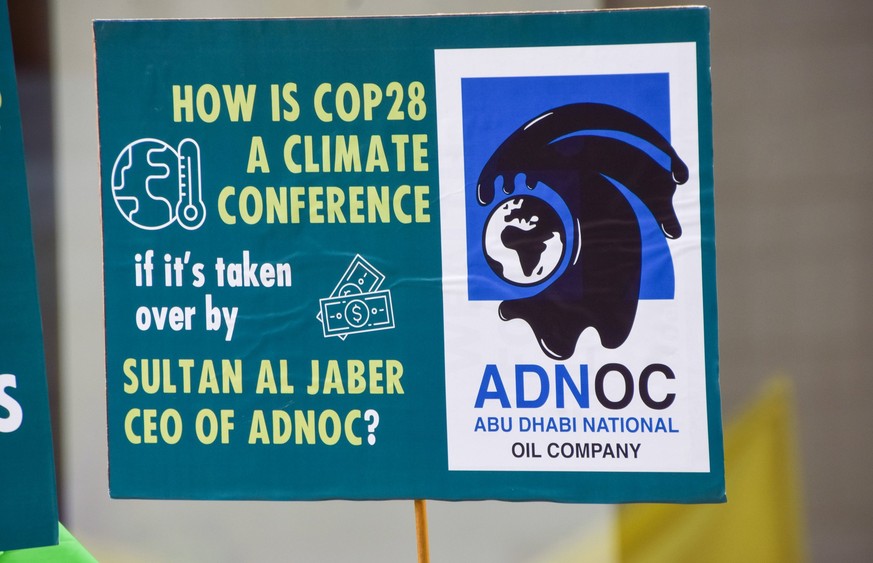 June 12, 2023, London, United Kingdom: A placard is seen which criticises the election of Sultan Al Jaber, the CEO of the Abu Dhabi National Oil Company ADNOC, as president of COP28, during the protes ...