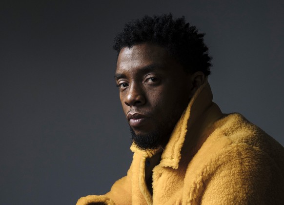 FILE - In this Feb. 14, 2018 photo, actor Chadwick Boseman poses for a portrait in New York to promote his film, &quot;Black Panther.&quot; Boseman, who played Black icons Jackie Robinson and James Br ...