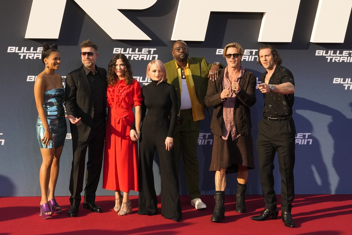 From left: Zazie Beetz, David Leitch, Kelly McCormick, Joey King, Brian Tyree Henry, Brad Pitt and Aaron Taylor-Johnson arrive for the premiere of the film 'Bullet Train' in Berlin, Germany, ...