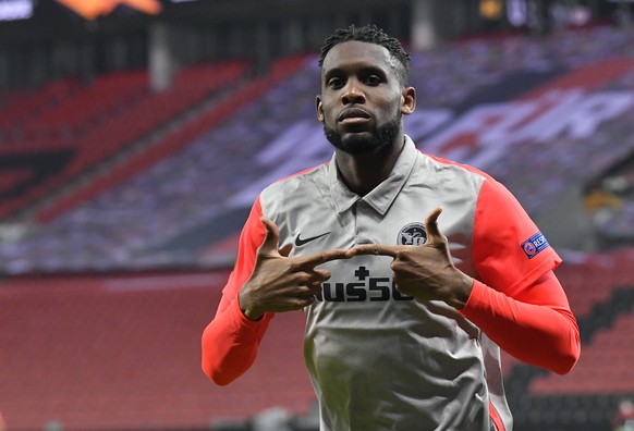 Young Boys&#039; Jordan Siebatcheu celebrates after scoring his side&#039;s opening goal during the Europa League round of 32, 2nd leg soccer match between Bayer 04 Leverkusen and Young Boys Bern in L ...