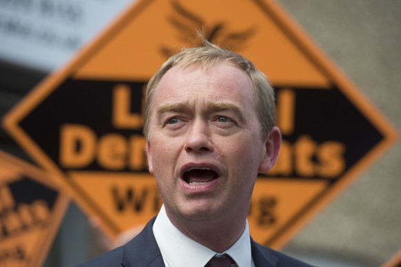 Britain&#039;s Liberal Democrats leader Tim Farron visits local voters at the campaign office in Carshalton southeast England while on the General Election Wednesday, June 7, 2017. The British general ...