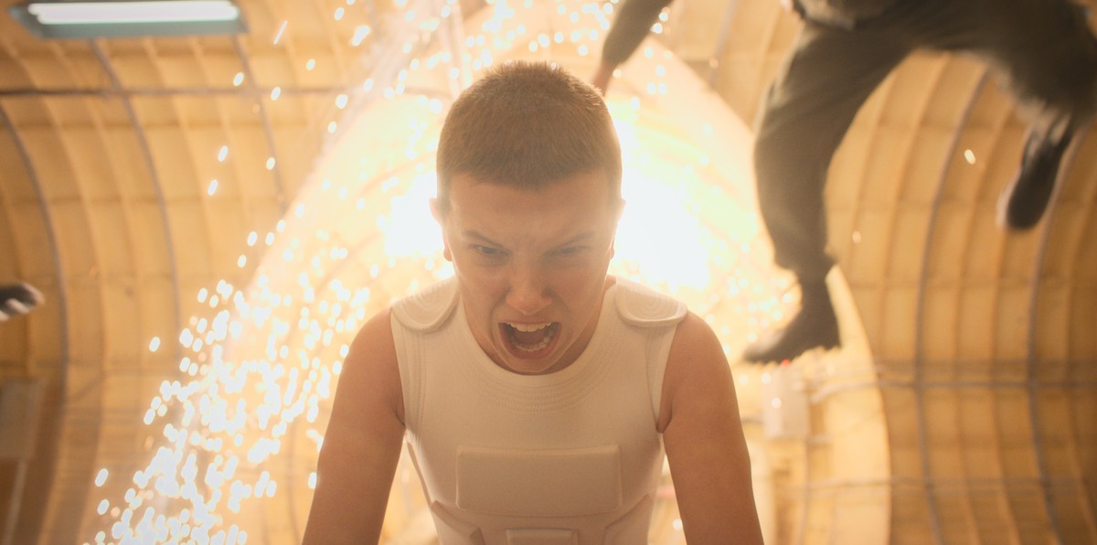 This image released by Netflix shows Millie Bobby Brown in a scene from "Stranger Things." (Netflix via AP)