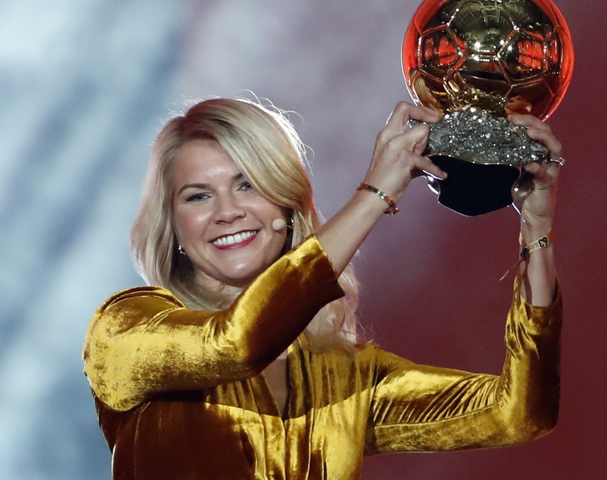 FILE - In this Dec. 3, 2018, file photo, Olympique Lyonnais soccer player Ada Hegerberg celebrates with the Women&#039;s Ballon d&#039;Or award during the Golden Ball award ceremony at the Grand Palai ...