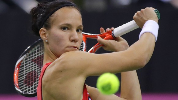 FILE - In this file photo dated Sunday April 23, 2017, Viktorija Golubic, of Switzerland, in action during the Fed Cup World Group semi final tennis match between Belarus and Switzerland, in Minsk, Be ...