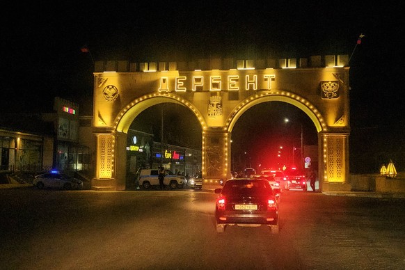 Russia: Situation in Derbent RUSSIA, DERBENT - JUNE 23, 2024: Police officers are on duty at an entrance to the city. Russia s Dagestan Republic has tightened security amid shooting incidents in the c ...