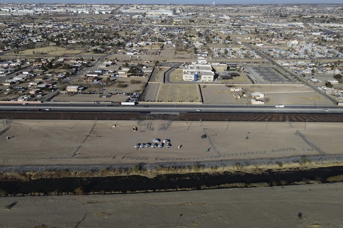 FILE - Texas National Guard vehicles are parked at Gate 36 in El Paso, Texas, as seen from the border city of Ciudad Juarez, Mexico, on Jan. 20, 2025. (AP Photo/Christian Chavez, File)
Immigration Tex ...