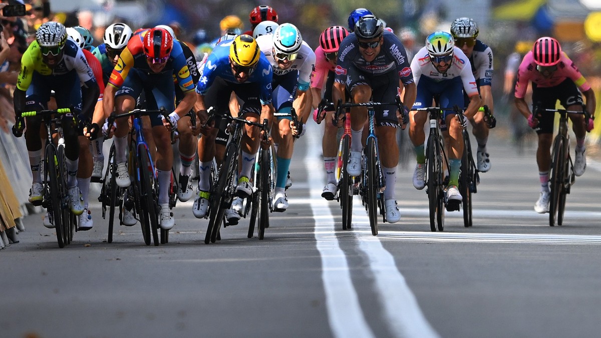TORINO, ITALY - JULY 01: (EDITOR'S NOTE: Alternate crop) (L-R) Dylan Groenewegen of Netherlands and Team Jayco AlUla, Arnaud De Lie of Belgium and Team Lotto Dstny, Biniam Girmay of Eritrea and T ...