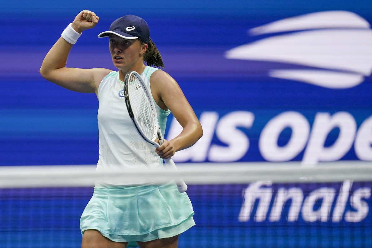 Iga Swiatek, of Poland, reacts after scoring a point against Ons Jabeur, of Tunisia, during the women's singles final of the U.S. Open tennis championships, Saturday, Sept. 10, 2022, in New York. ...