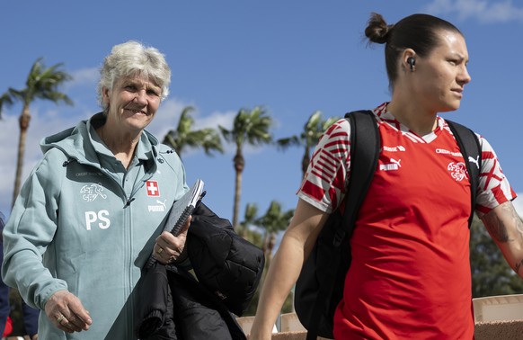 epa11175250 Switzerland&#039;s head coach Pia Sundhage, center, and Switzerland&#039;s Ramona Bachmann, right, and Switzerland&#039;s Riola Xhemaili, left, arrive at Marbella Football Center, prior to ...
