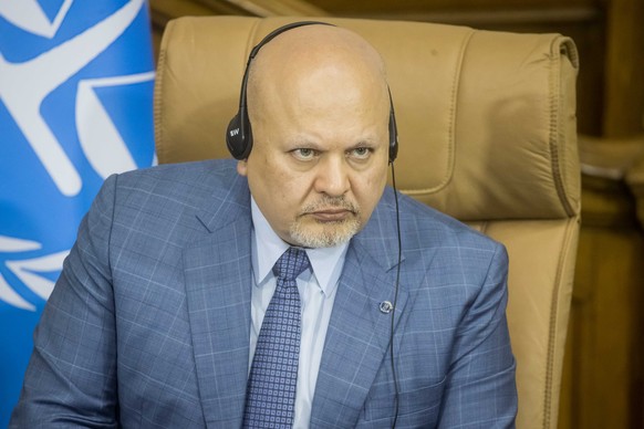epa11294948 Prosecutor of the International Criminal Court (ICC), Karim Khan, listens to the Attorney General of Venezuela, Tarek William Saab, and the President of the National Assembly, Jorge Rodrig ...