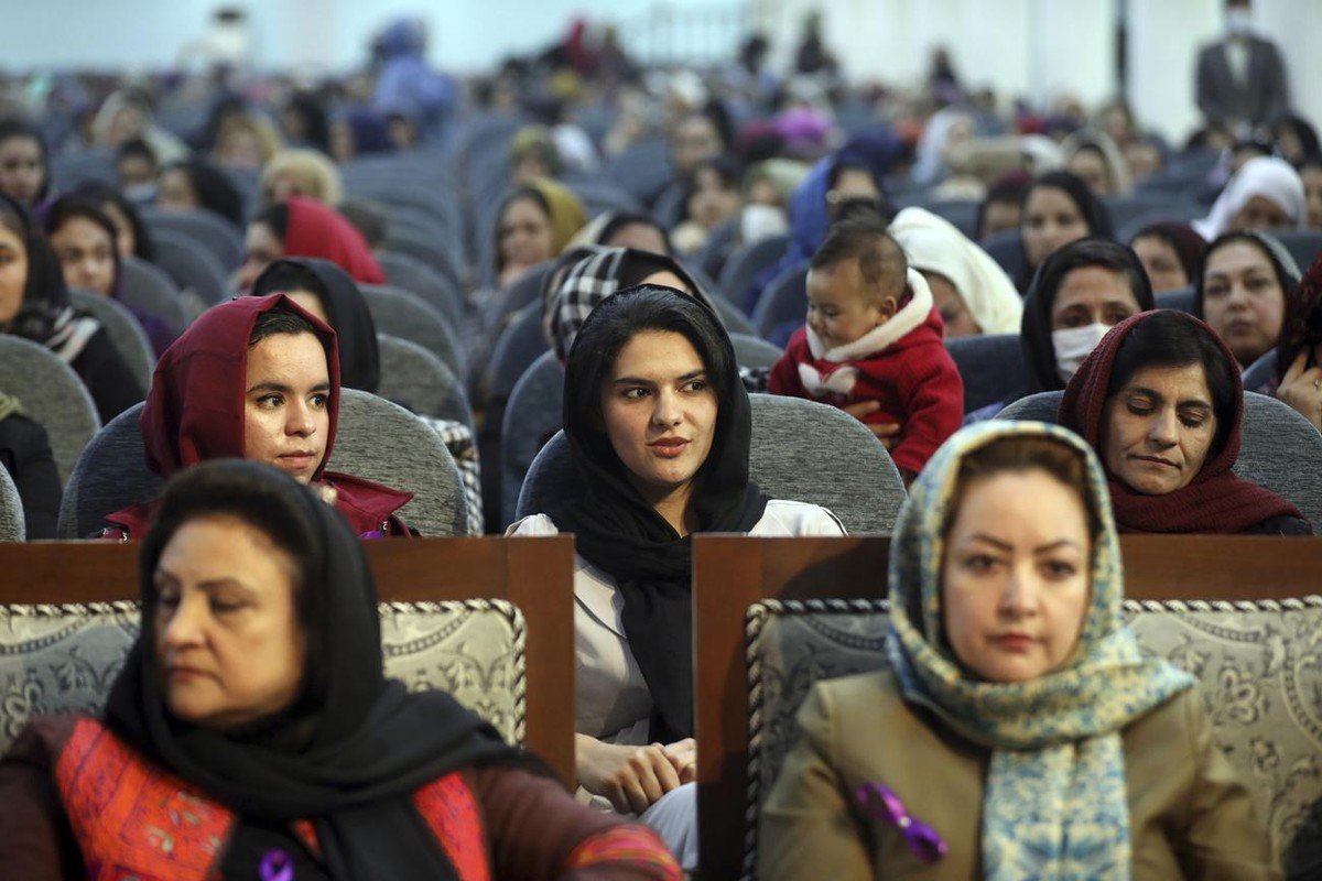 Afghan women attend an event to mark International Women's Day in Kabul, Afghanistan, Sunday, March 7, 2021. (AP Photo/Rahmat Gul)