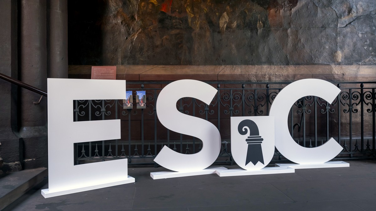 epa11573202 The letters ESC (Eurovision Song Contest) and a Basel emblem are displayed in the courtyard of the town hall in Basel, Switzerland, 30 August 2024. The Eurovision Song Contest 2025 will be ...