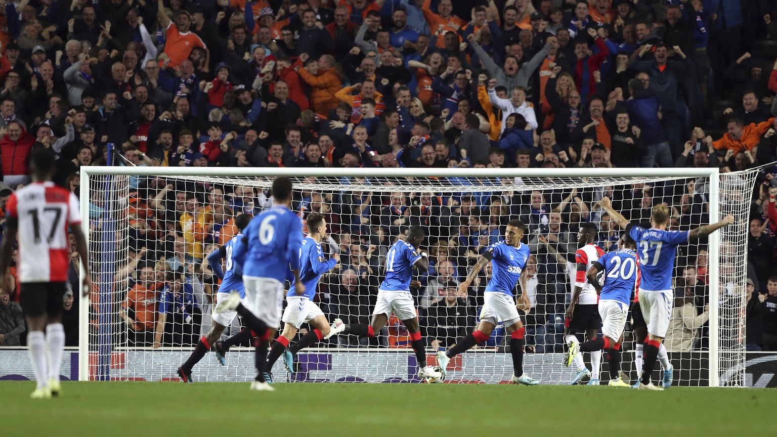 Rangers Sheyji Ojo, center, celebrates his goal with his teammates during the Europa League group G soccer match between Rangers and Feyenoord at Ibrox, Glasgow, Scotland, Thursday, Sept. 19, 2019. (A ...