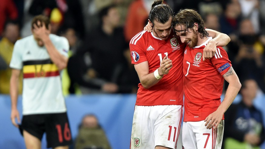 epa05402563 Gareth Bale (L) and Joe Allen of Wales celebrate after Wales won 3-1 in the UEFA EURO 2016 quarter final match between Wales and Belgium at Stade Pierre Mauroy in Lille Metropole, France,  ...