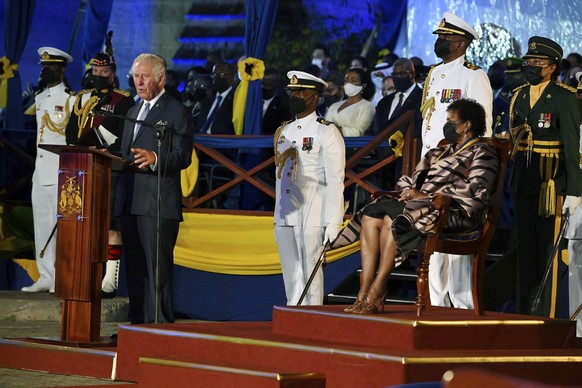 Britain&#039;s Prince Charles, speaks as President of Barbados, Dame Sandra Mason, right, listens, during the Presidential Inauguration Ceremony, at Heroes Square, in Bridgetown, Barbados, Tuesday, No ...