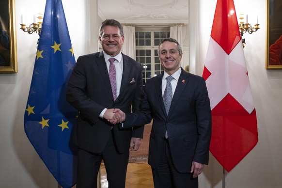 epa10524832 Swiss Federal Councilor Ignazio Cassis (R), welcomes Maros Sefcovic, Vice-President of the European Commission during a working visit in Bern, Switzerland, 15 March 2023. EPA/PETER SCHNEID ...