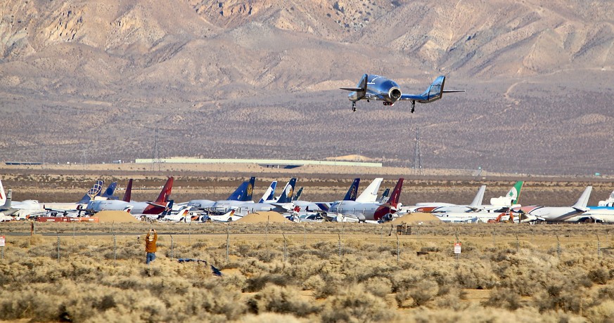 Virgin Galactic lands after the spaceship climbed more than 50 miles high above California’s Mojave Desert on Thursday, Dec. 13, 2018. The rocket ship reached an altitude of 51 miles (82 kilometers) b ...