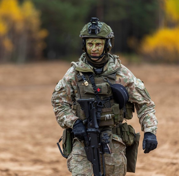 A Lithuanian soldier takes part in the combined arms live fire military exercise &#039;Strong Griffon 2025&#039; at a training range in Pabrade, north of the capital Vilnius, Lithuania, Wednesday, Oct ...