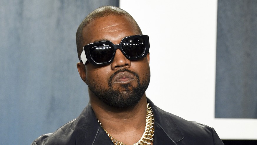 FILE - Kanye West arrives at the Vanity Fair Oscar Party on Feb. 9, 2020, in Beverly Hills, Calif. The rapper formerly known as Kanye West is offering to buy right-wing friendly social network Parler  ...