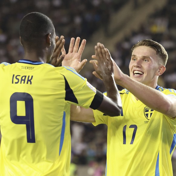Sweden&#039;s Alexander Isak, left, celebrates with Viktor Gyokeres after scoring his side&#039;s second goal during the UEFA Nations League soccer match between Azerbaijan and Sweden at the Tofiq Bah ...