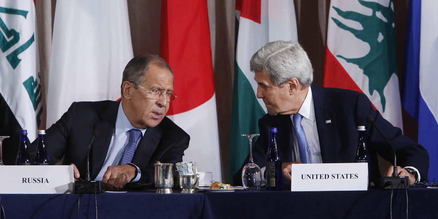 Russia&#039;s Foreign Minister Sergey Lavrov, left, and United States Secretary of State John Kerry talk during a meeting of the International Syria Support Group, Thursday, Sept. 22, 2016, in New Yor ...