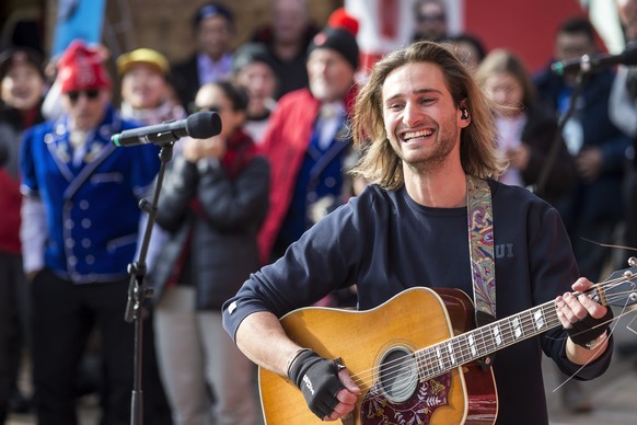 Swiss snowboarder Patrick Burgener performs during his concert at the House of Switzerland at the XXIII Winter Olympics 2018 in Pyeongchang, South Korea, on Thursday, February 15, 2018. (KEYSTONE/Alex ...