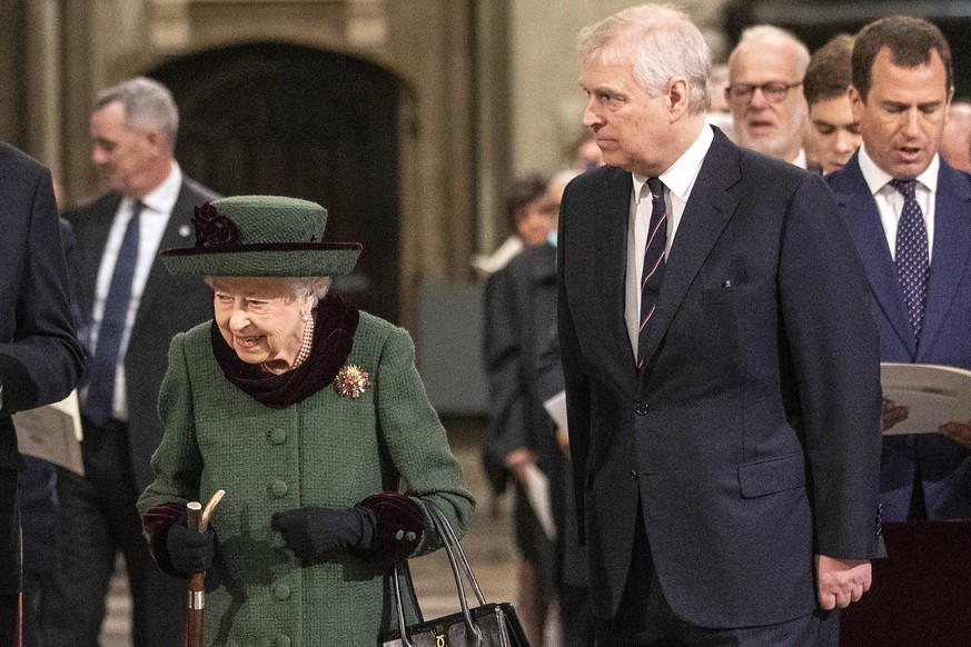 Britain&#039;s Queen Elizabeth II and Prince Andrew, center right, arrive for a Service of Thanksgiving for the life of Prince Philip, Duke of Edinburgh, at Westminster Abbey in London, Tuesday, March ...