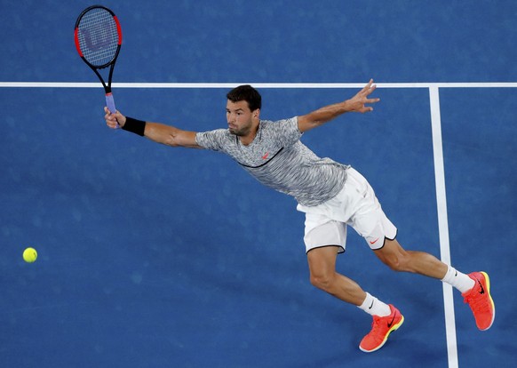 Tennis - Australian Open - Melbourne Park, Melbourne, Australia - early 22/1/17 Bulgaria&#039;s Grigor Dimitrov reaches to hit a shot during his Men&#039;s singles third round match against France&#03 ...