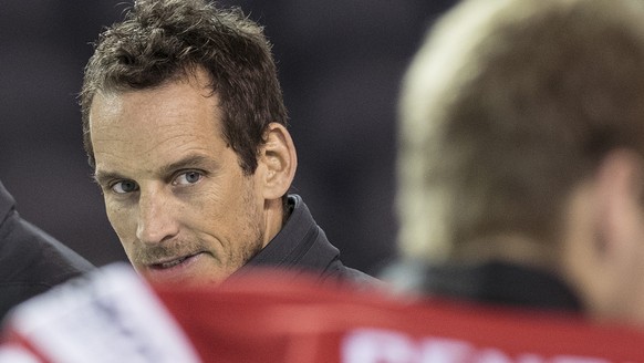 Switzerland&#039;s Tommy Albelin, assistant coach, left, and Patrick Fischer, head coach pose during a photo session before a training session during the Ice Hockey World Championship in Paris, France ...