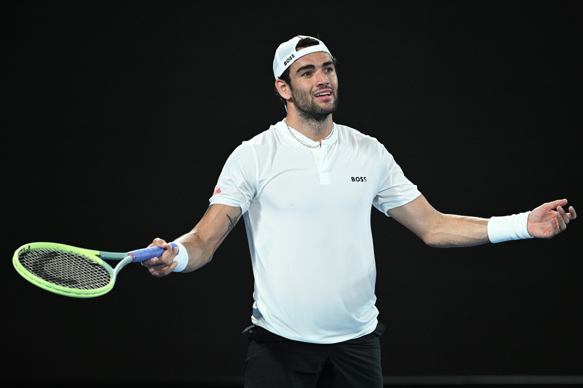 epa10410089 Matteo Berrettini of Italy reacts during his first round singles match against Andy Murray of Britain at the 2023 Australian Open tennis tournament at Melbourne Park in Melbourne, Australi ...