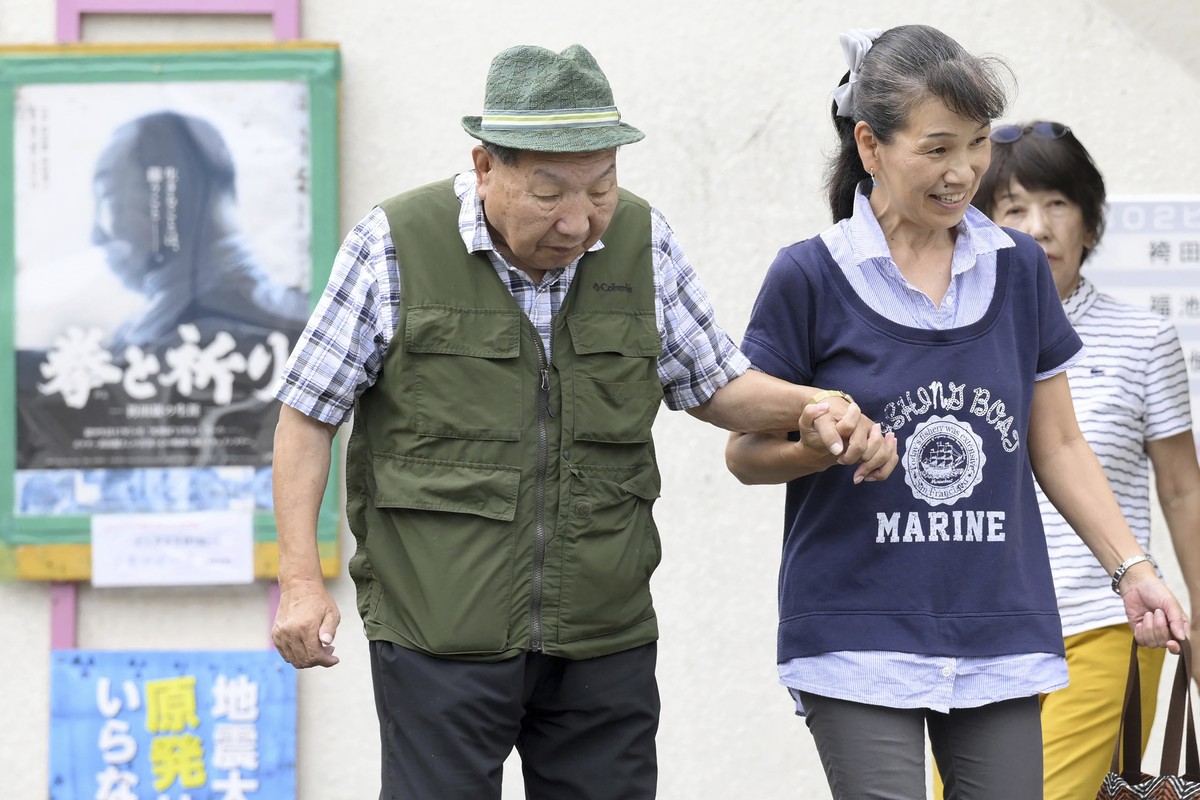 Iwao Hakamada, left, 88-year-old former boxer who has been on death row for nearly six decades after his murder conviction that his lawyers said was based on forced confession and fabricated evidence, ...