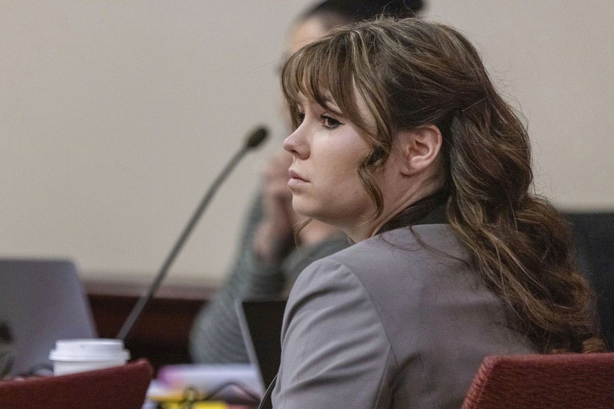 Hannah Gutierrez-Reed, the former armorer on the set of the movie "Rust," listens to Corporal Alexandra Hancock, with the Santa Fe Sheriff's Office, testify during Gutierrez-Reed's ...