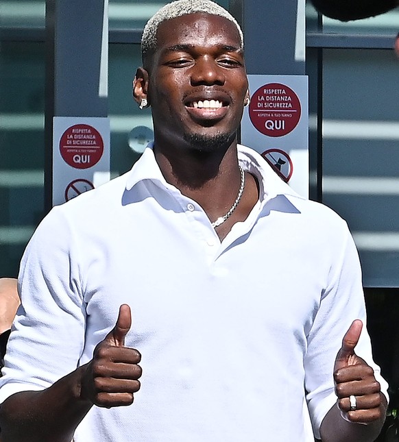 epa10061126 New Juventus&#039; player Paul Pogba arrives at the J Medical center to undergo medical tests, in Turin, Italy, 09 July 2022. The French international has arrived in Turin to complete his  ...