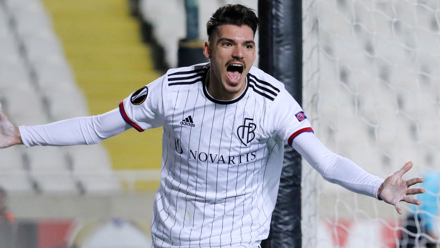 epa08232488 Raoul Petretta of Basel celebrates after scoring the opening goal during the UEFA Europa League Round of 32, 1st leg match between APOEL Nicosia and Basel in Nicosia, Cyprus, 20 February 2 ...