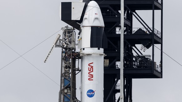 epa12731733 The SpaceX Dragon spacecraft on a Falcon 9 Block 5 rocket, carrying the NASA Crew 12 mission, is docked in the Space Launch Complex 40, Cape Canaveral Space Force Station, Florida, USA, 12 ...